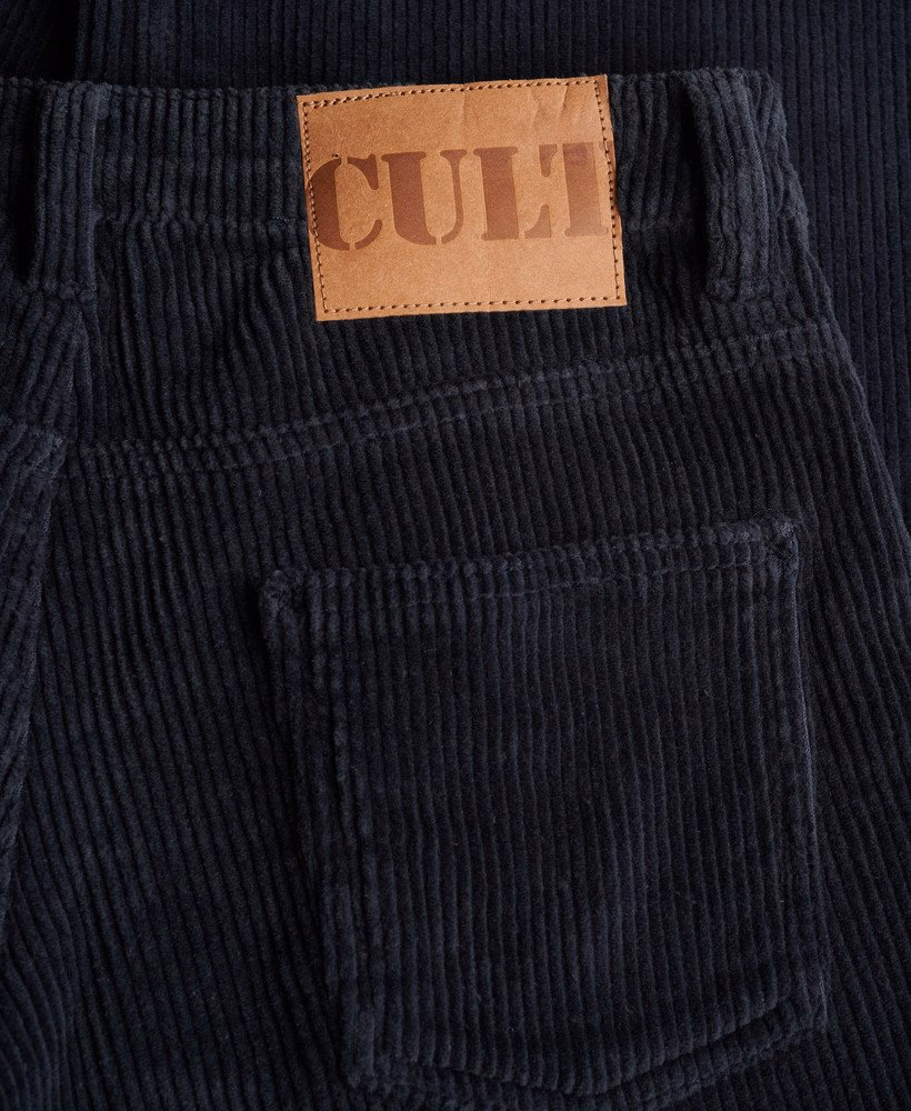 Calça de veludo cotelê jumbo folgada de cintura média