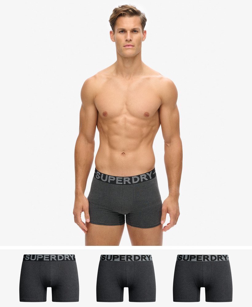 pacote com três cuecas boxer de algodão orgânico na cor raven black mescla.
