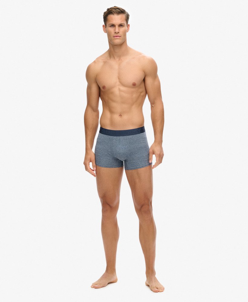 pacote com três cuecas boxer de algodão orgânico nas cores cinza marinho fosco cinza Índigo mesclado e azul marinho mesclado.