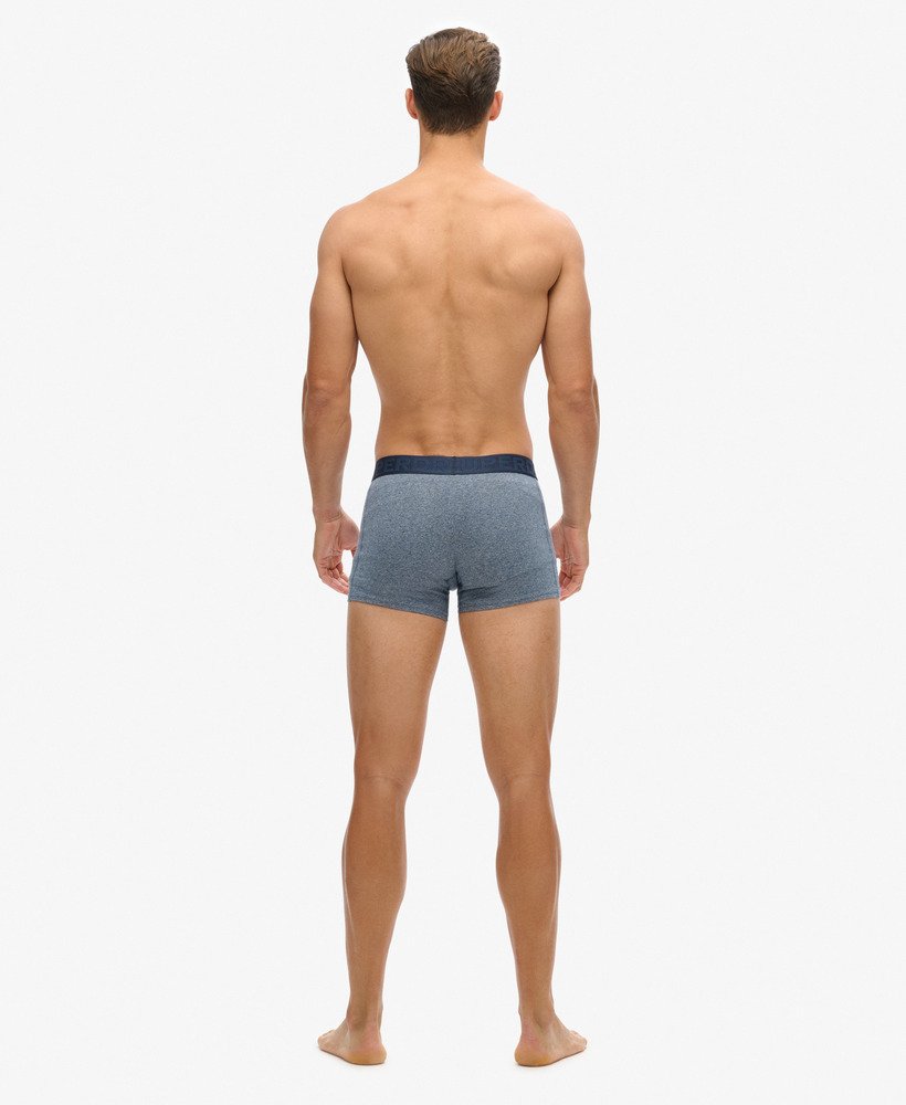 pacote com três cuecas boxer de algodão orgânico nas cores cinza marinho fosco cinza Índigo mesclado e azul marinho mesclado.