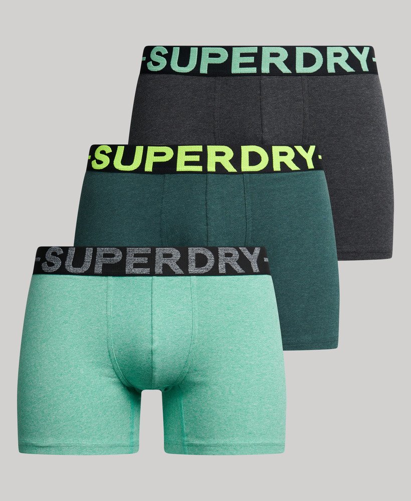 pacote com três cuecas boxer de algodão orgânico nas cores preto mesclado verde mesclado e verde fresco mesclado.