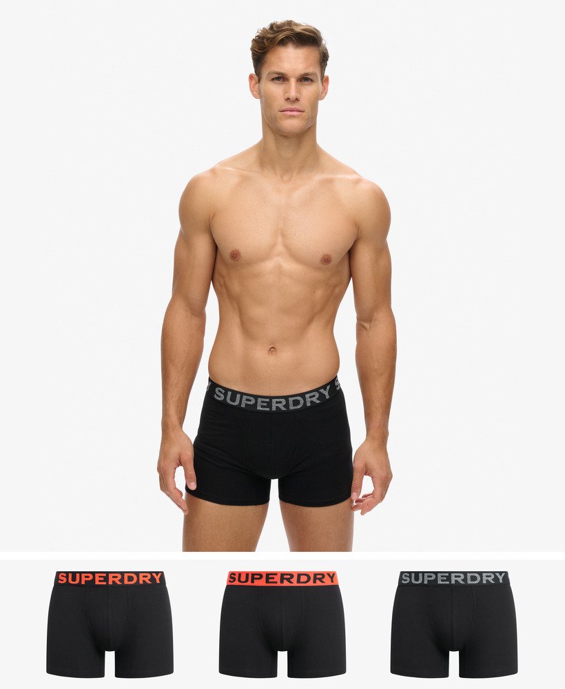 pacote com três cuecas boxer de algodão orgânico nas cores pretolaranja.