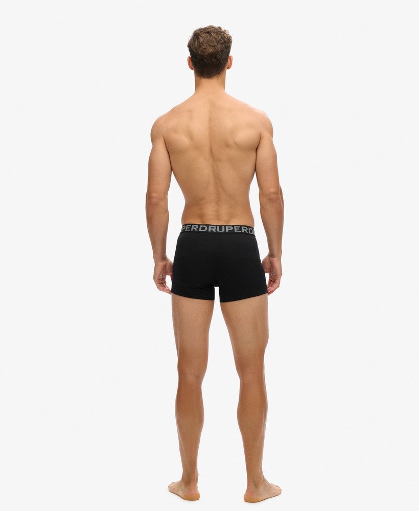 pacote com três cuecas boxer de algodão orgânico nas cores pretolaranja.